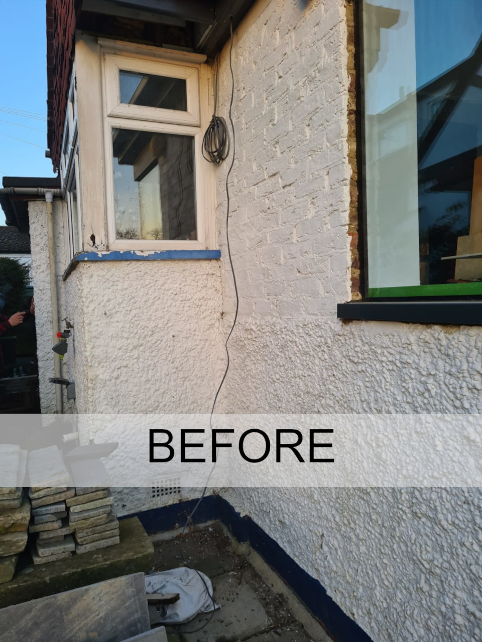 Apply top layer of waterproof render to brickwork.